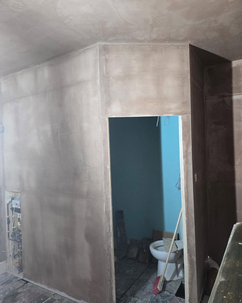 New smooth wall built around a bathroom doorway