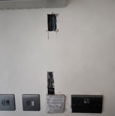 Open chases above a row of sockets